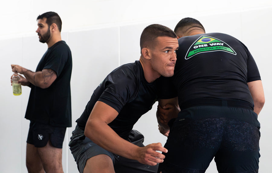 No-Gi takedown drill with a coach watching at One Way Martial Arts in Alexandria, VA