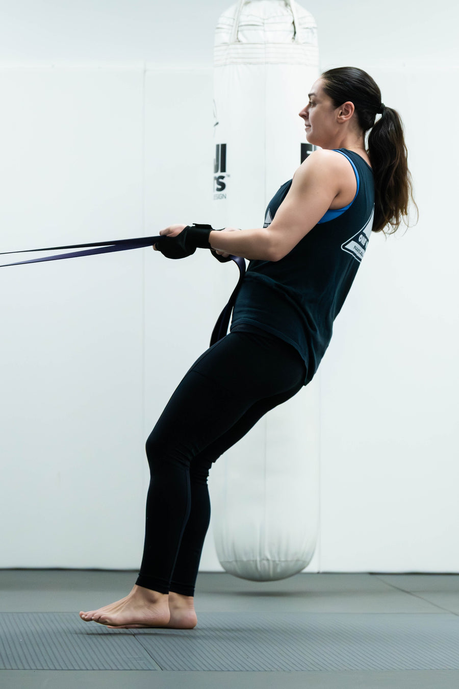 Athlete doing resistance band rows in Strength and Conditioning at One Way Martial Arts, Alexandria VA