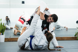 BJJ students drilling a guard technique at One Way Martial Arts in Alexandria, VA