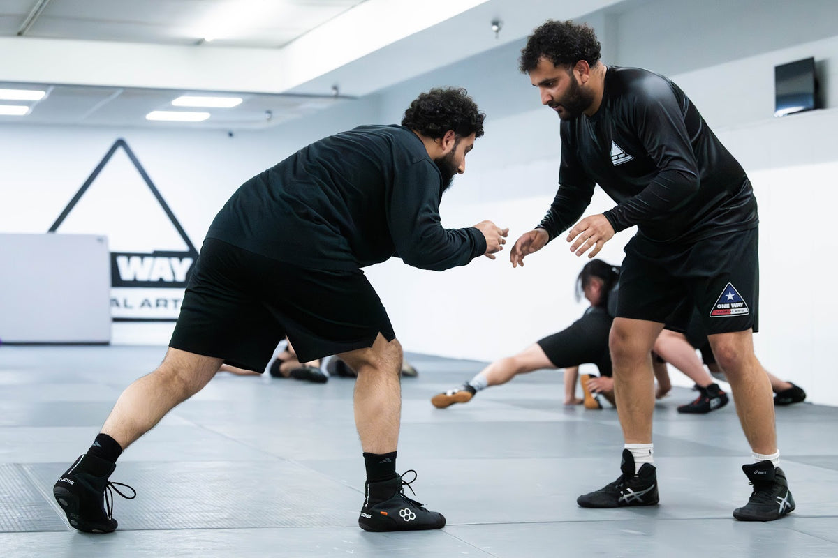 Wrestling class action Alexandria VA One Way