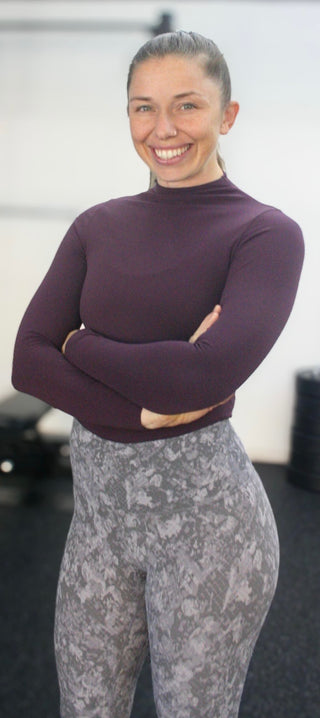 Coach Asia Rideout, pregnancy and postpartum strength coach at One Way Performance in Alexandria, VA