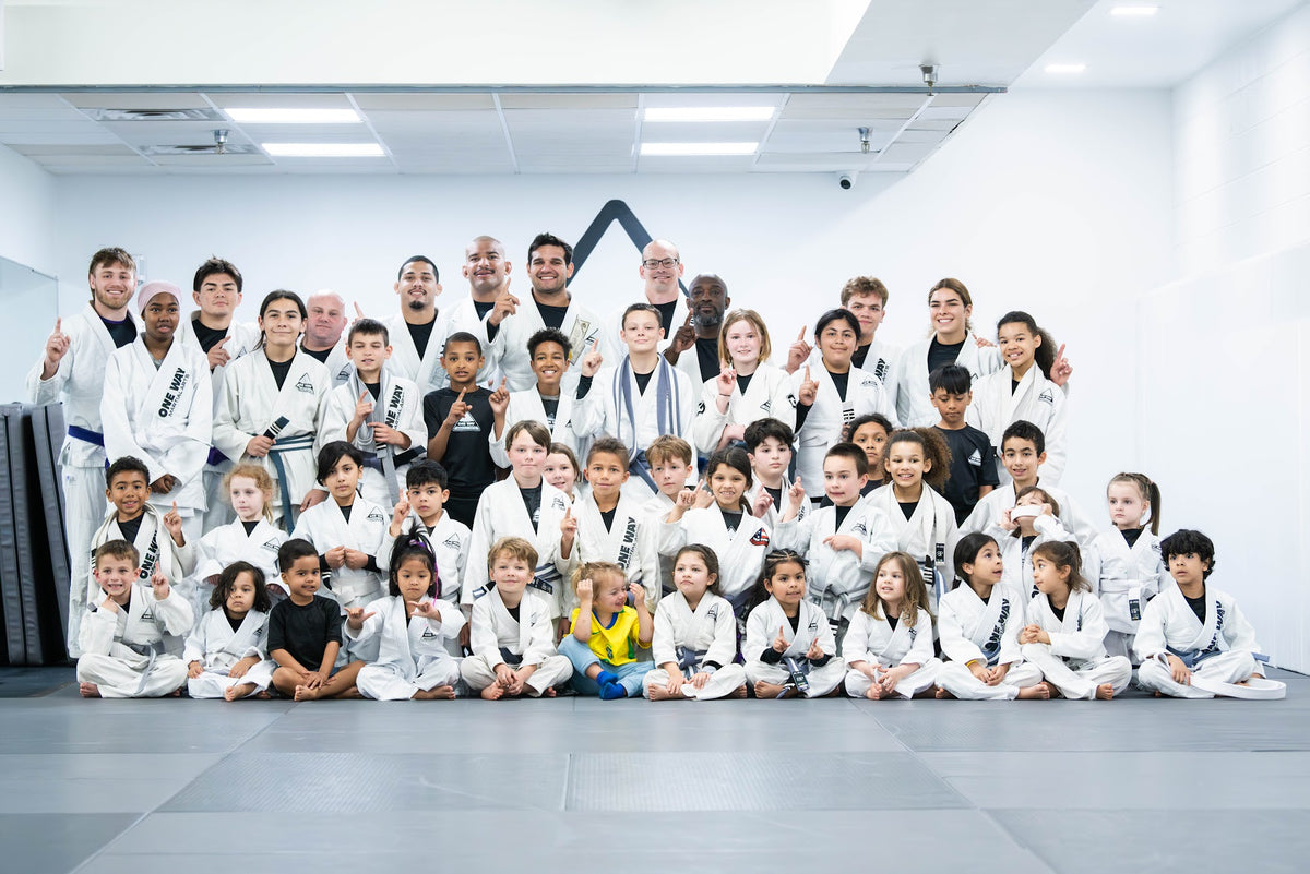 Kids BJJ team photo at One Way Martial Arts in Alexandria, VA