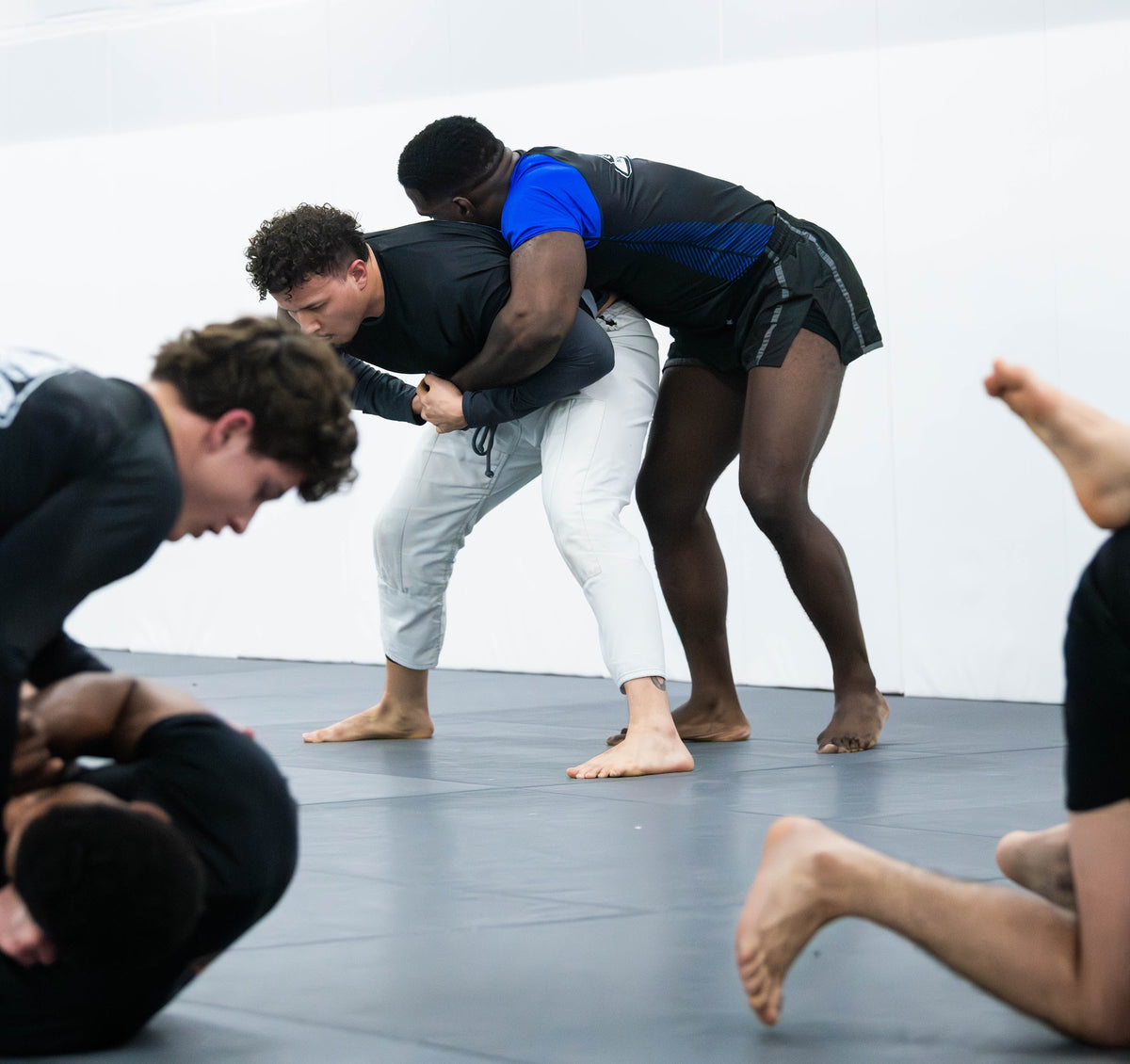No-Gi grapplers scrambling during class at One Way Martial Arts in Alexandria, VA