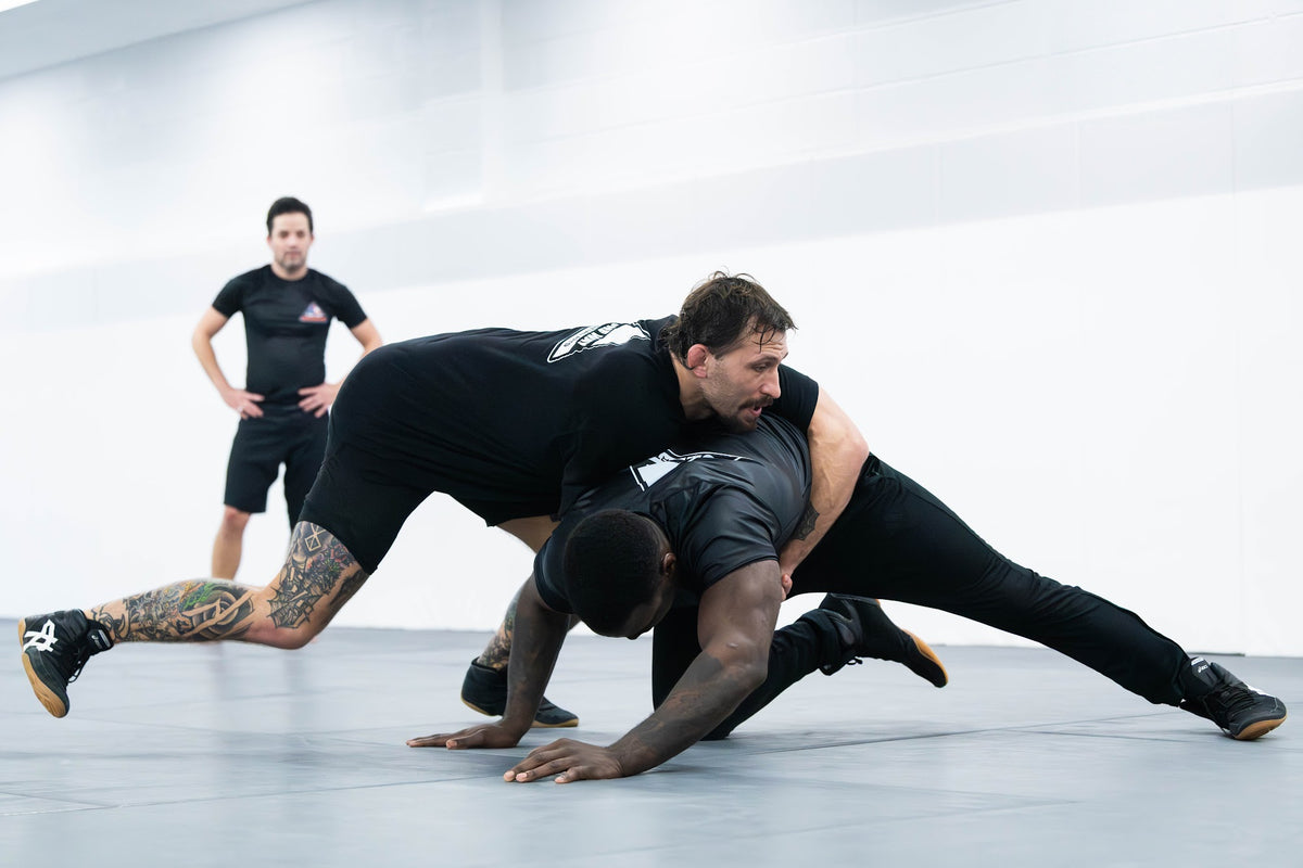 No-Gi grappler shooting a low single leg at One Way Martial Arts in Alexandria, VA