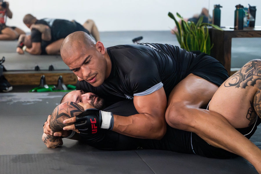 No-Gi grappler controlling his partner from top position at One Way Martial Arts